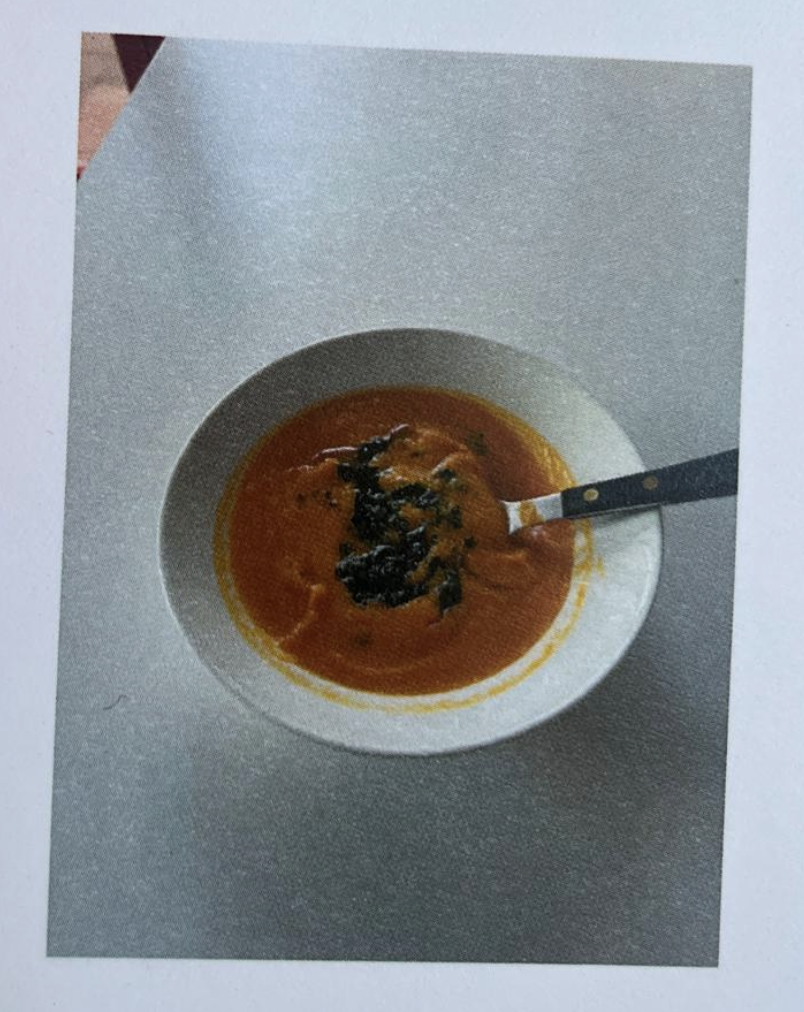 Pumpkin soup with parsley sauce